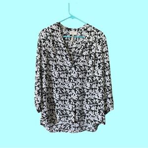 Women’s Large deep v-neck floral blouse